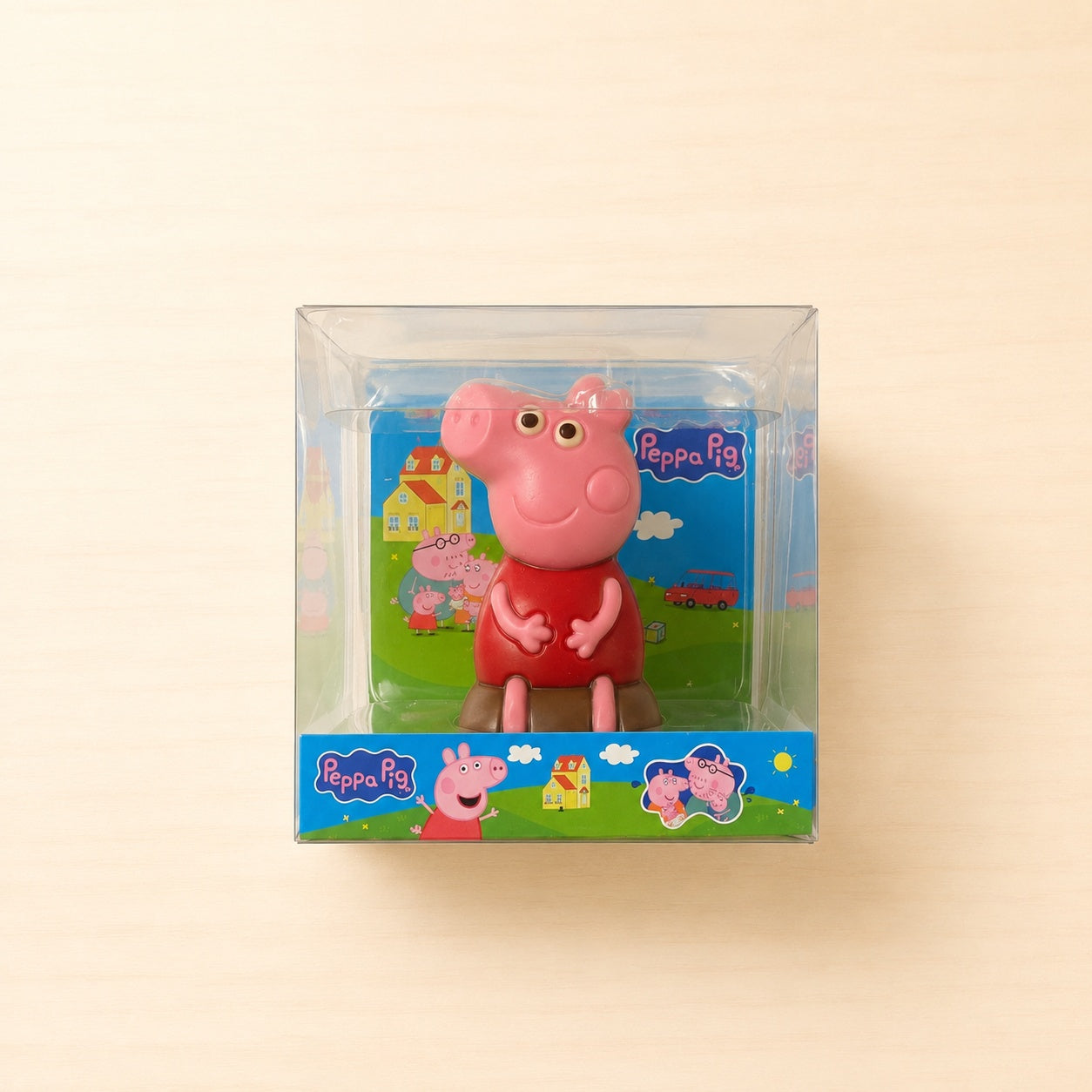 Peppa Pig Schokoladenfigur aus Edelvollmilchschokolade in transparenter Geschenkverpackung.