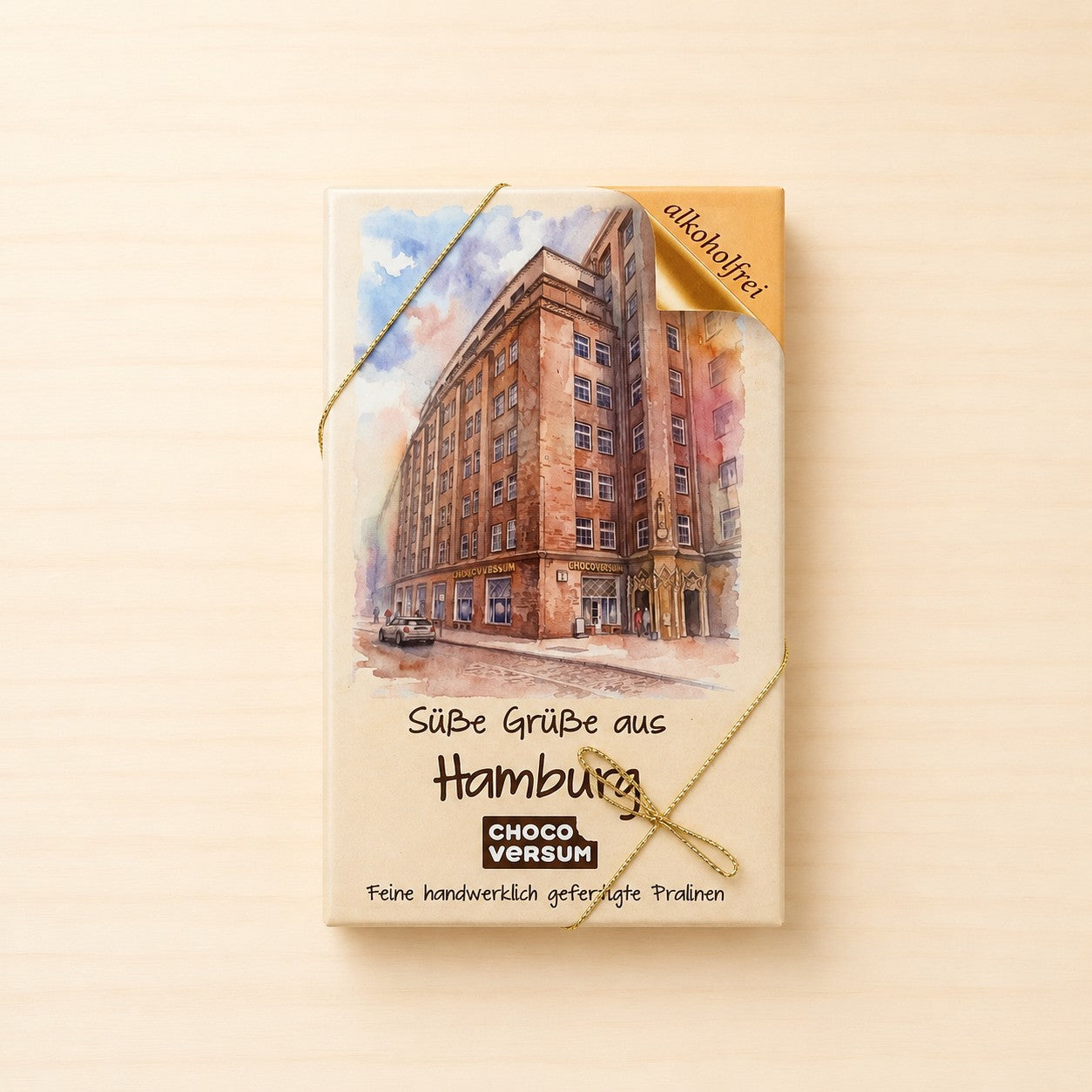 Pralinenschachtel „Süße Grüße aus Hamburg“ mit Illustration des CHOCOVERSUMs und handwerklich gefertigten, alkoholfreien Pralinen.