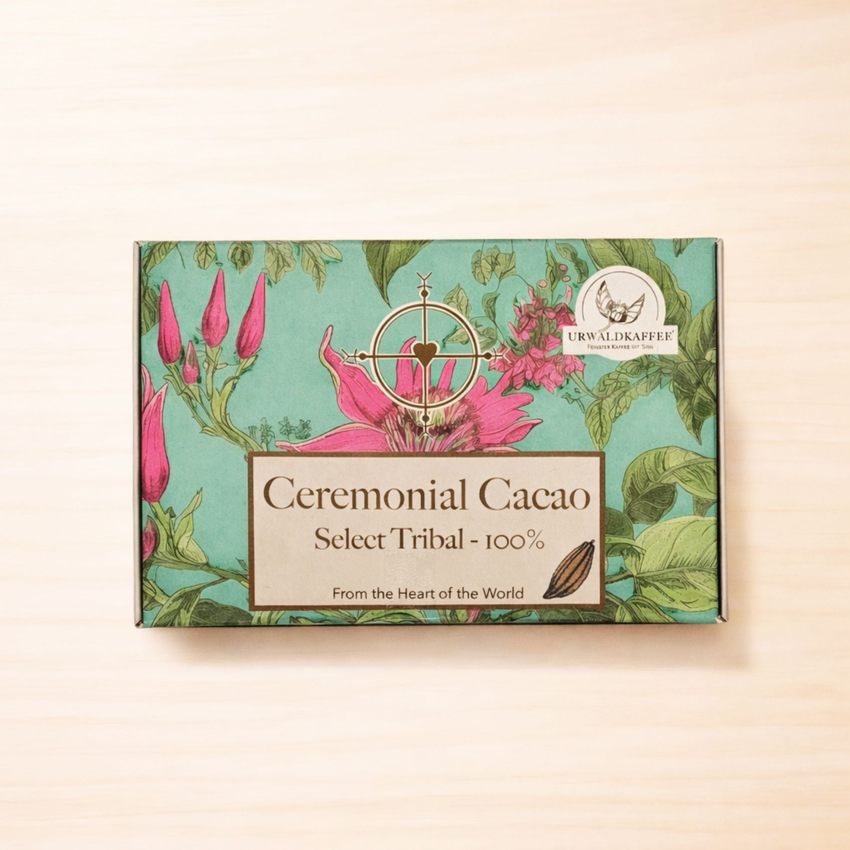 Verpackung von zeremoniellem 100 % Kakao mit floraler Gestaltung in Türkis und Rosa